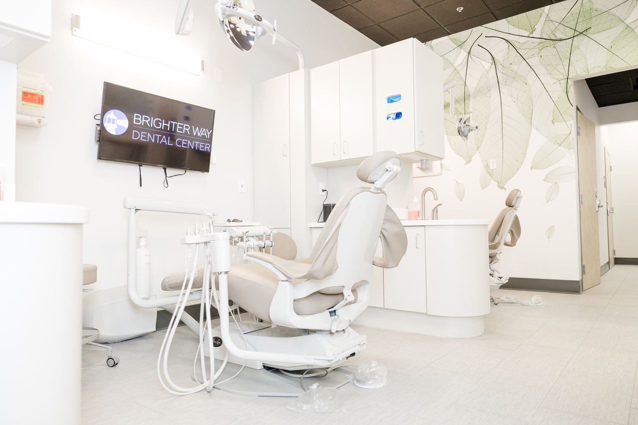 The Brighter Way Dental Center team providing attentive patient care